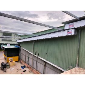 Mái xếp lượn sóng che không gian quán trà sữa chợ quang vinh 3