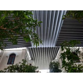 Thi công giá rẻ mái xếp lượn sóng che không gian hành lang đi bộ giữa các toà nhà tại khu dân cư Đảo Ngọc TP Thủ Đức HCM