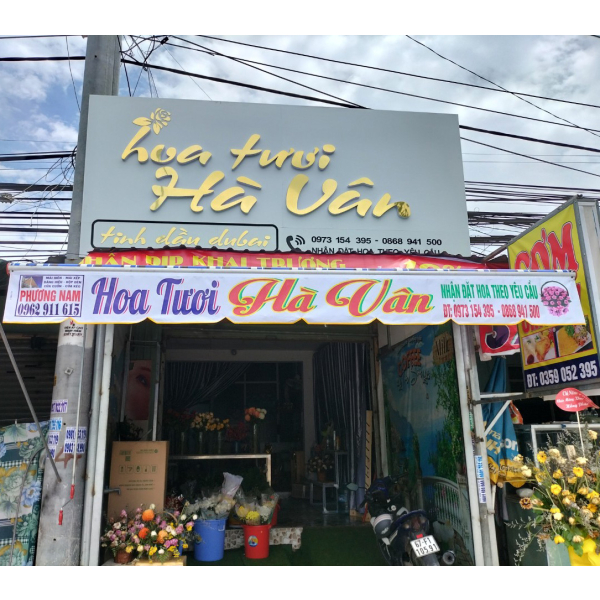 Mái hiên tay quay - Mái che mưa nắng cửa hàng bán hoa tươi tại Tân Uyên Bình Dương
