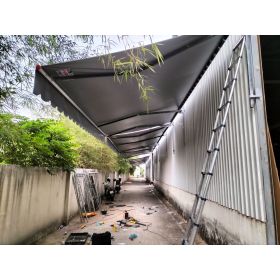 Mái xếp Phương Nam đã thi công bàn giao mái hiên di động che hành lang công ty gỗ Hoa Song tại Khánh Bình Tân Uyên Bình Dương